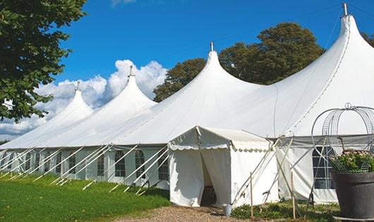 high-quality portable toilets stationed at a wedding, meeting the needs of guests throughout the outdoor reception in Middlebury IN